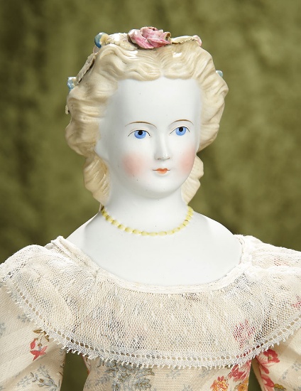 21" German bisque lady doll with sculpted hair, Dresden flowers, yellow bead necklace. $500/750