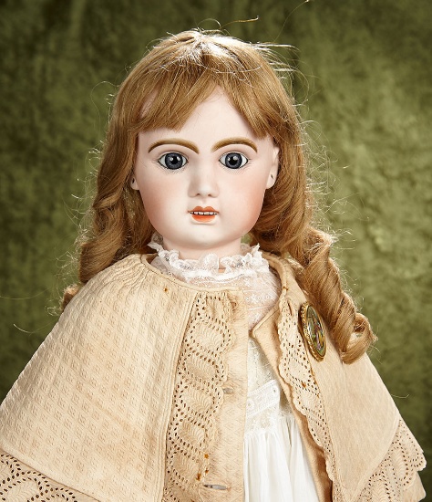 29" French bisque bebe by Jumeau, size 13, with lovely costume, original body. $1400/1700