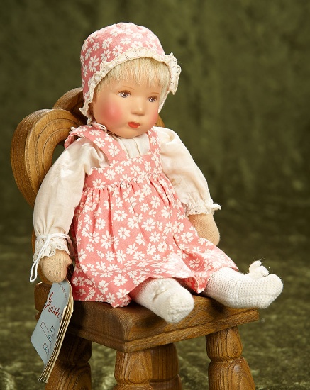 10" German cloth-bodied doll "Baby II H O" by Kathe Kruse, original costume and booklet. $200/300