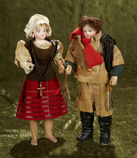 11" Pair, French bisque man and woman as fisherman couple, original costumes. $800/1200