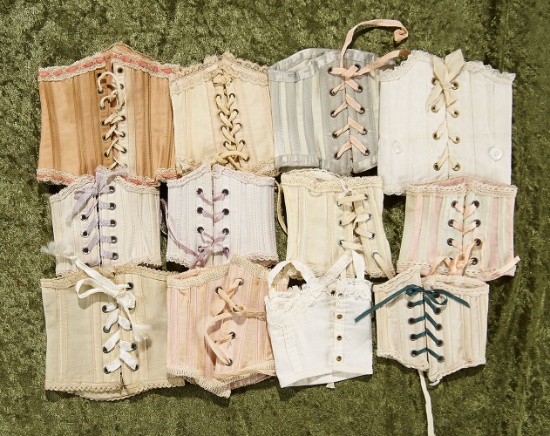 Twelve antique bebe stays in various sizes and colors. $200/300