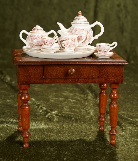 7"h. French tea table with softpaste miniature tea service. $400/500