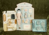 Group of doll accessories on presentation cards. $400/500