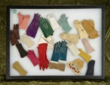 Twenty three pairs of antique leather gloves for poupees. $500/700