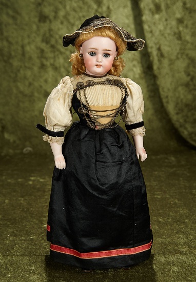 16" German bisque doll with original Swiss folklore costume, rare swivel head. $700/900
