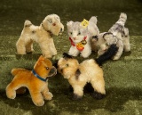 Five miniature mohair dogs and kittens by Steiff. $300/500