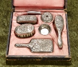 Miniature silverplate toilette service in original case. $300/500
