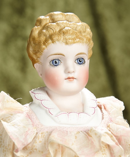 19" German bisque doll with rare sculpted hair and glass eyes, model 135, by Kling. $800/1100