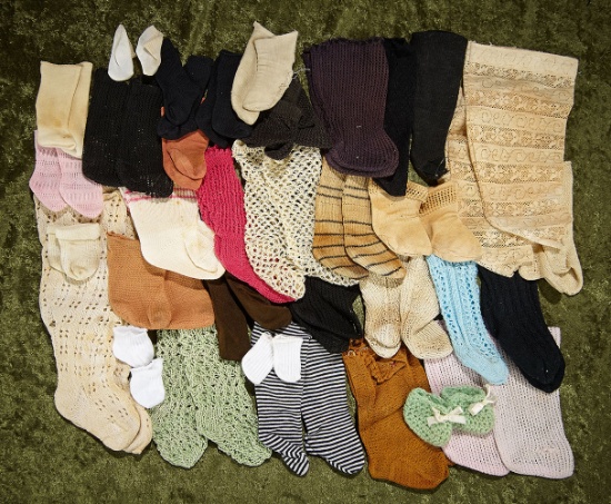 A large collection of doll socks, mostly antique, some handknit. $300/400