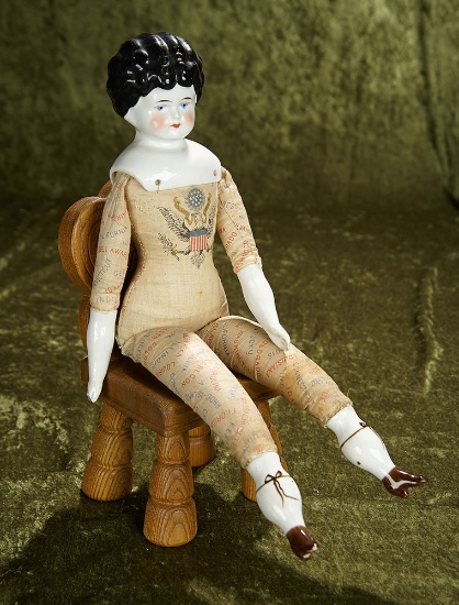 17" German porcelain doll with rare American States lithographed body. $300/500