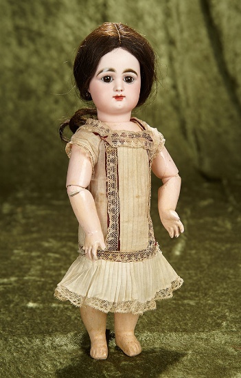 12" French bisque closed mouth bebe by Rabery and Delphieu, size 4/0. $1800/2300