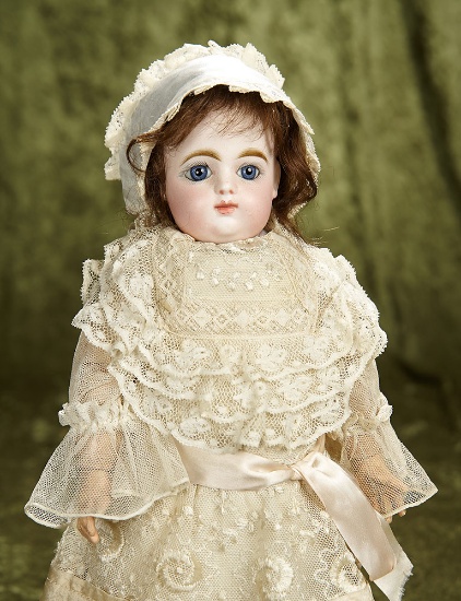 15" French bisque bebe with blue paperweight eyes, closed mouth by Gaultier, size 3. $2400/2800