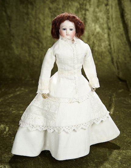 15" French bisque poupee, cobalt blue eyes, delicate bisque, antique pique costume. $1400/1800