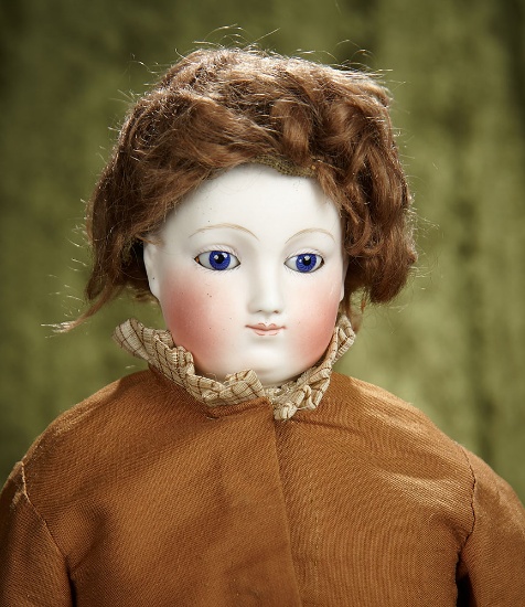 20" Early French bisque poupee with swivel head and cobalt blue eyes. $1400/2100