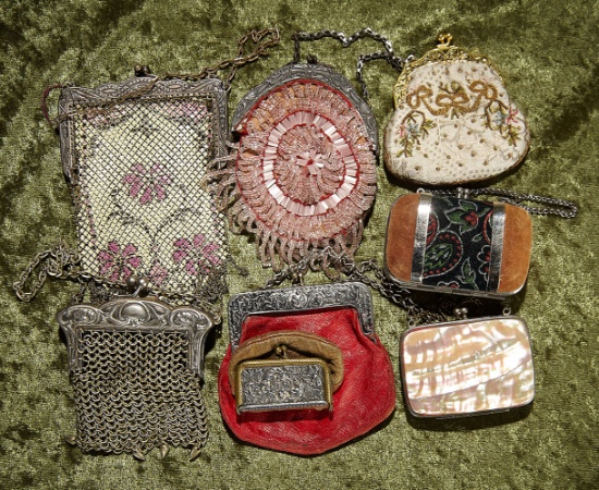 Eight 3"-5" antique purses suitable for doll accessorizing. $300/400