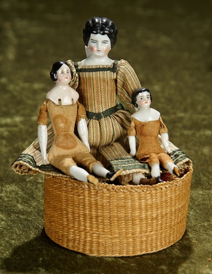 3 1/2" - 7" Trio of German porcelain dollhouse dolls.$200/300