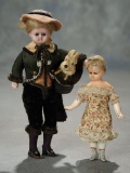 Two Early German Wax Miniature Dolls in Original Costumes 600/900