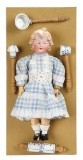 German Bisque Character Girl on Original Sample Board with Kitchenware 500/800