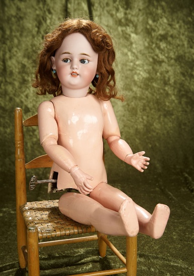 24" Bisque doll with walking mechanism and flirty eyes by Roullet et Decamps. $900/1100