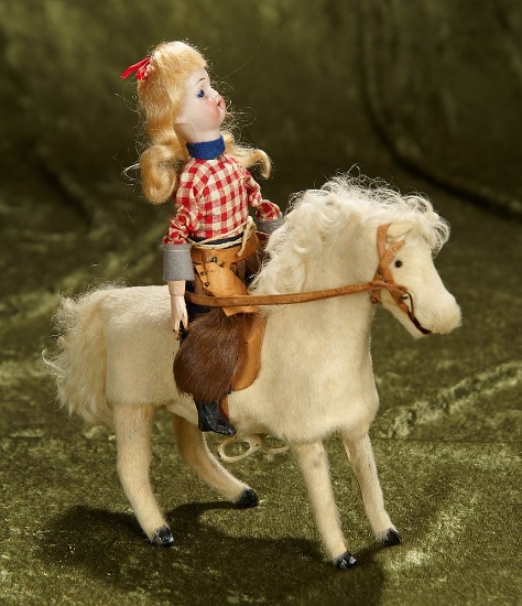 8"l. French mechanical toy "Cowboy on Horse". $500/750