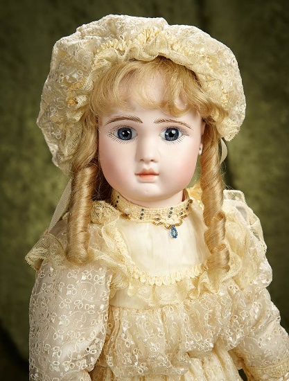 24" French bisque bebe, Figure A. by Jules Steiner, with original signed body. $2800/3200