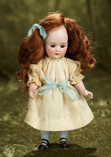 7" German all-bisque character girl with rare grey stockings by Hertwig. $300/400