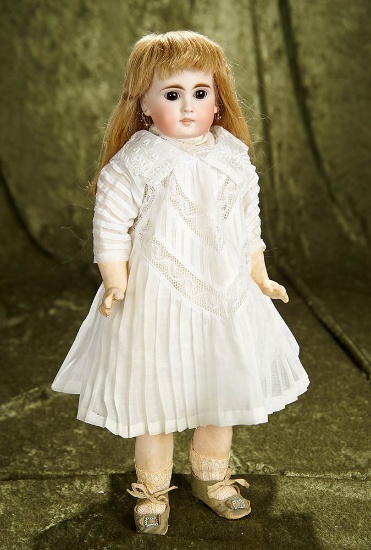 15" Sonneberg bisque doll, model 183, with closed mouth, gentle expression. $800/1100