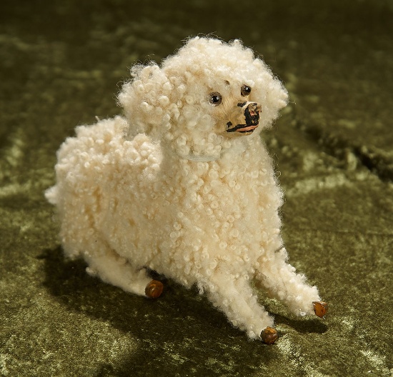 6" French mechanical jumping poodle with glass eyes. $400/600