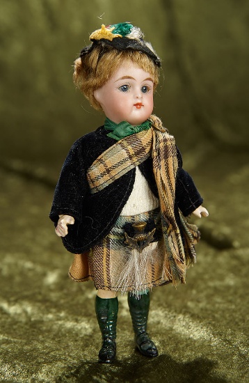 5" German bisque child, K*R closed mouth orig Scottish costume, painted green leggings. $400/500