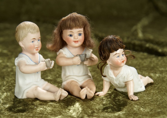 3 1/2" Three German all-bisque figures of young children with interesting variations. $400/500