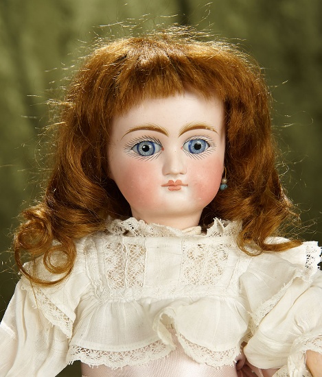 Sonneberg bisque doll with closed mouth by mystery maker. $600/800