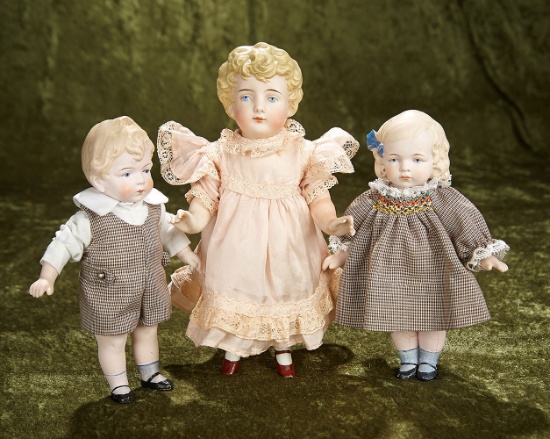 7"-9" Three German all-bisque miniature dolls with sculpted hair by Hertwig. $500/700