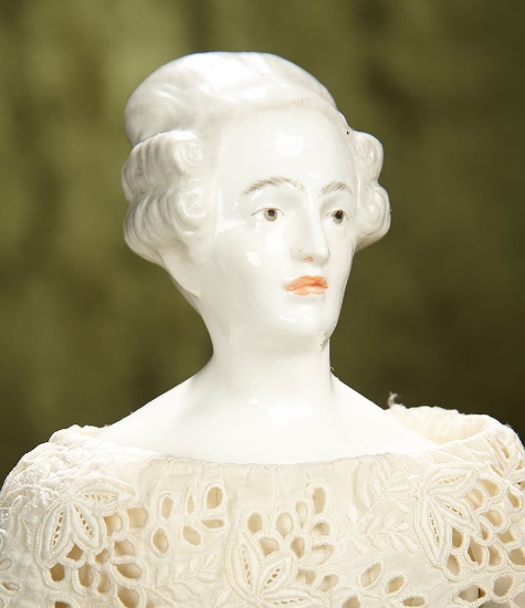 14" German porcelain lady with rare coiffure from Bavarian Art Guild series of 1911. $500/700
