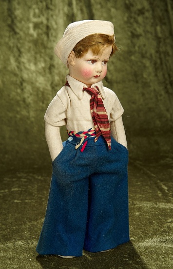 16" French felt character doll with painted brown hair and original costume by Raynal. $400/500