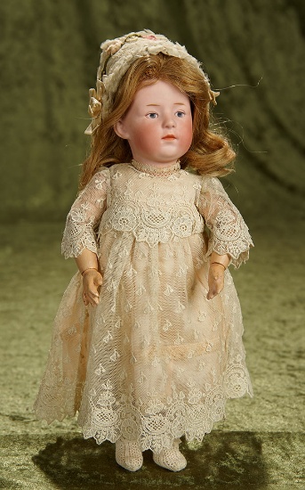 10" German bisque painted eye character, 6970, by Gebruder Heubach. $400/600