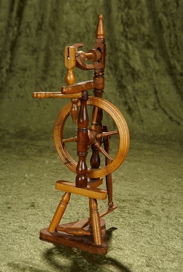 16" Wooden spinning wheel with elaborate construction, great for display. $200/400