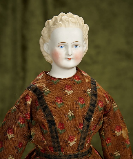 15" German bisque lady with unusually sculpted coiffure, expressive features. $400/500