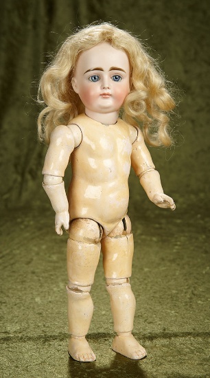 15" German bisque doll with closed mouth by Kestner. $800/1200