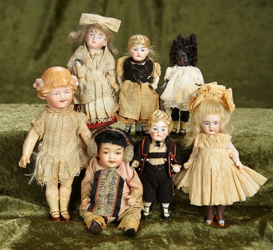 Lot, 3 1/2" - 7" Seven German miniature bisque dolls. $600/800
