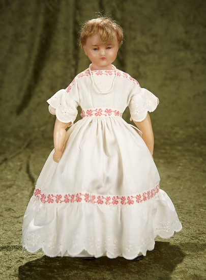 13" Petite English poured wax child doll with enamel eyes, antique costume. $400/500
