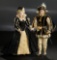 Pair, 19th-Century Bisque Dolls in Elaborate 18th-Century Style Costumes 500/700