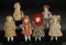 Six German All-Bisque Miniature Dolls in Factory Original Costumes 400/600