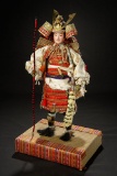 Japanese Ningyo as Samurai Warrior with Elaborate Regalia and Original Signature Box  1000/1400