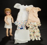 French Bisque Bebe Bleuette with Trousseau of Rare Costumes 700/900