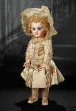 French Bisque Bebe by Emile Jumeau, Fine Couturier Costume by Ernestine Jumeau  8000/11,000