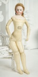 French Bisque Poupee with Dehors Articulation and Au Nain Bleu Boutique Label  2800/3500