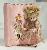 German All-Bisque Doll in Original Costume with Rose Silk Embroidered Wrap 600/800