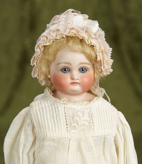 11" German bisque closed mouth doll marked 2 with original body. $600/800