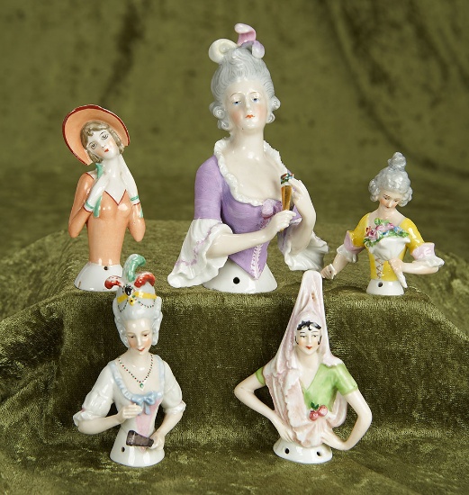 3"-5" Five German porcelain half-dolls of 18th century ladies in stylish costume. $400/500
