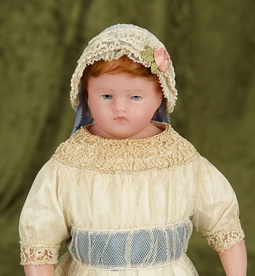 16" English poured wax child doll with small glass eyes, lace costume. $800/1000